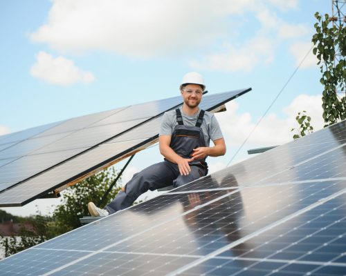 solar-panel-technician-installing-solar-panels-sunny-day-1